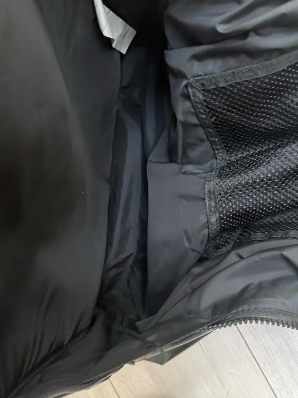 Sleek Shiny Black Leather Backpack